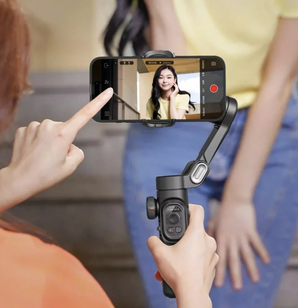 Auto Face Tracking Tripod Stand - onlinemegasale.com Auto Face Tracking Tripod Stand - onlinemegasale.com