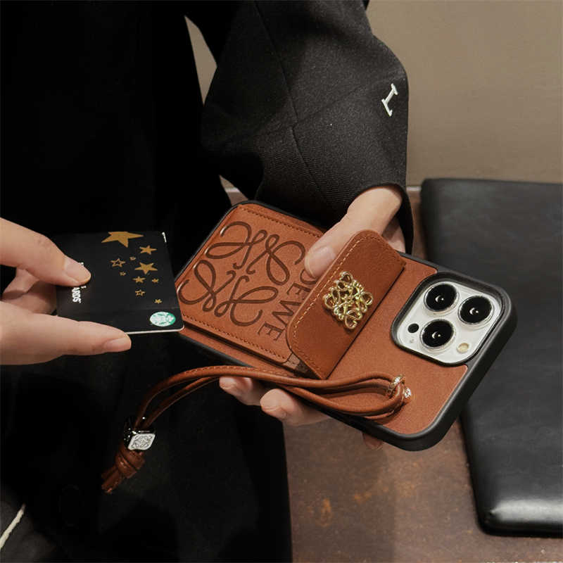 Luxury LOEWE Leather Wallet Case With Bracelet For iPhone 12-16 Pro - onlinemegasale.com Luxury LOEWE Leather Wallet Case With Bracelet For iPhone 12-16 Pro - onlinemegasale.com