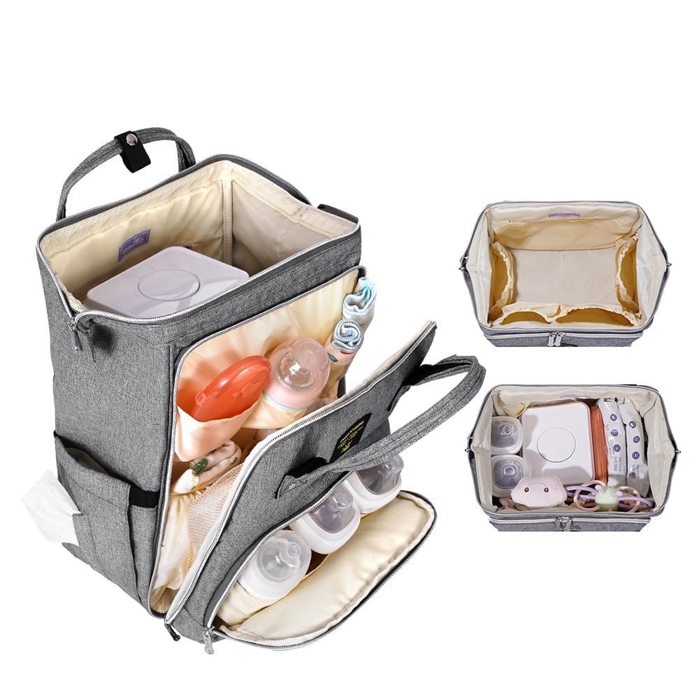 S0ad8661c1a9845248e6d3f94536bbad6W Multi-functional Stylish Baby Bag - onlinemegasale.com