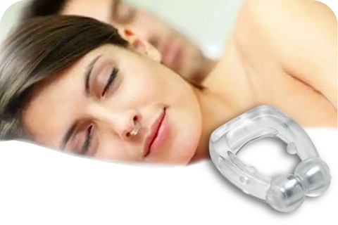 women sleeping with anti snoring device