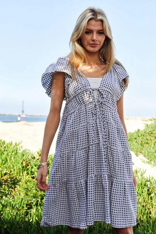 efa577e1861e45f7ba4e76473517ebd3-Max-Origin Jacquard V-Neck Flutter Cap Sleeve Tiered Dress - onlinemegasale.com